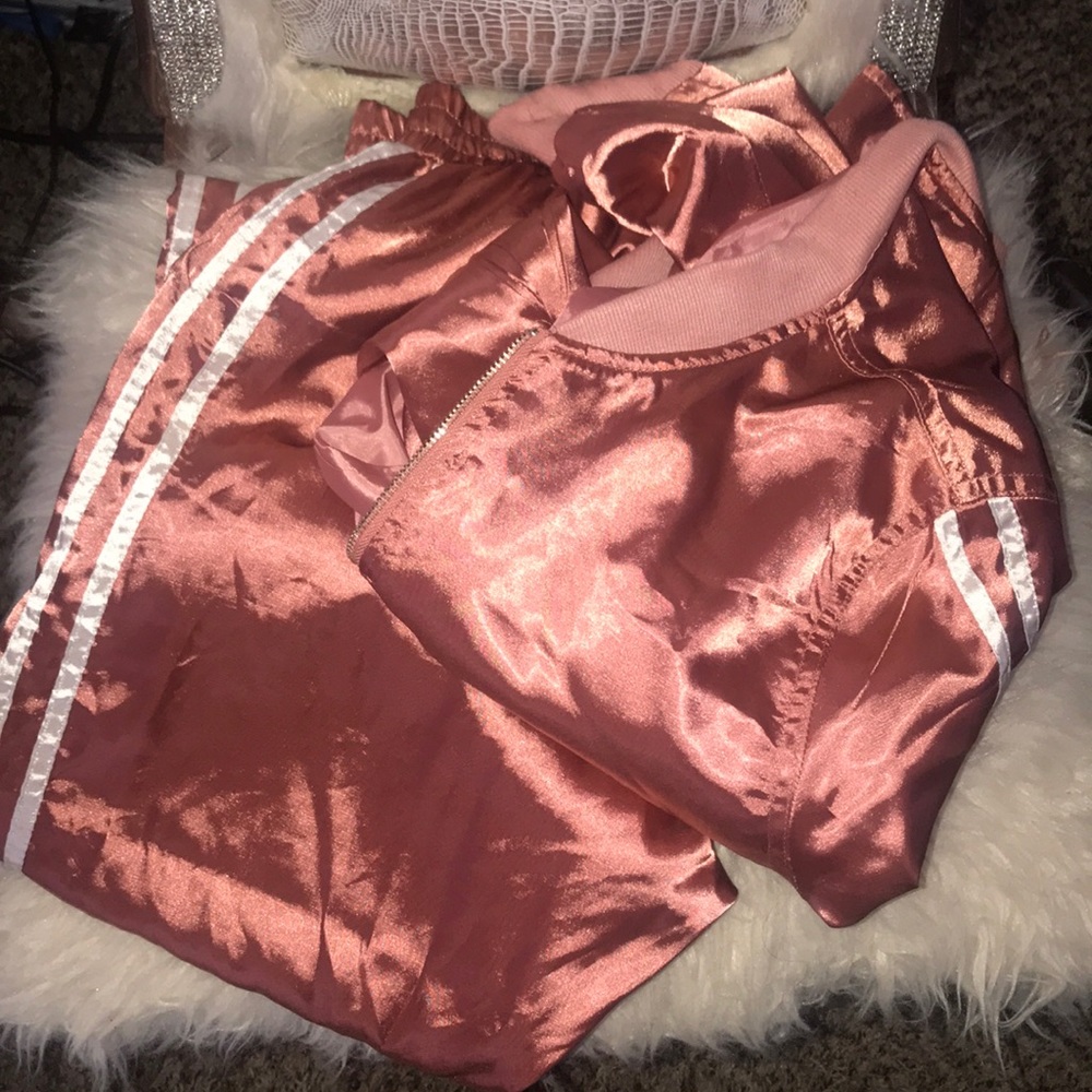 Silk like pink jogging suit